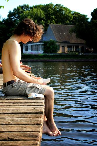 Reading Bare–Chested